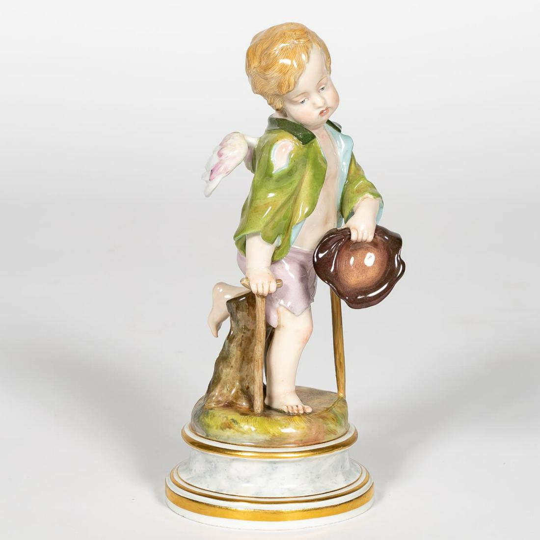 Meissen Porcelain Figure of a Cherub as a Begger: Meissen (German, founded 1710), 1815-1924. Polychrome hard-paste porcelain figure of a cherub wearing torn clothing with a crutch. Marked to underside with impressed 44. Approx. h. 8.75".