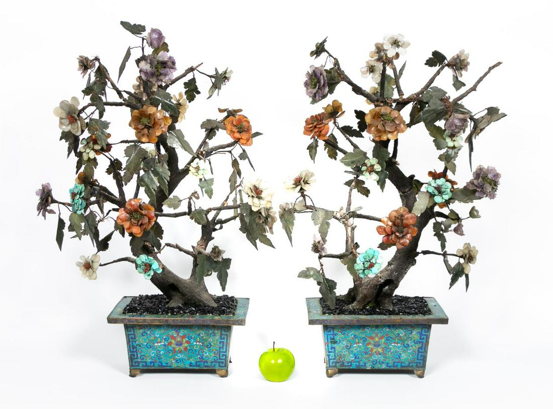 Pair, Chinese Jade Trees in Cloisonne Planters: Chinese, 20th century. Pair of large jade and hardstone trees having wooden trunks, obesdian gravel and mounted in rectangular turquoise ground cloisonne planters with polychrome floral decoration. Un
