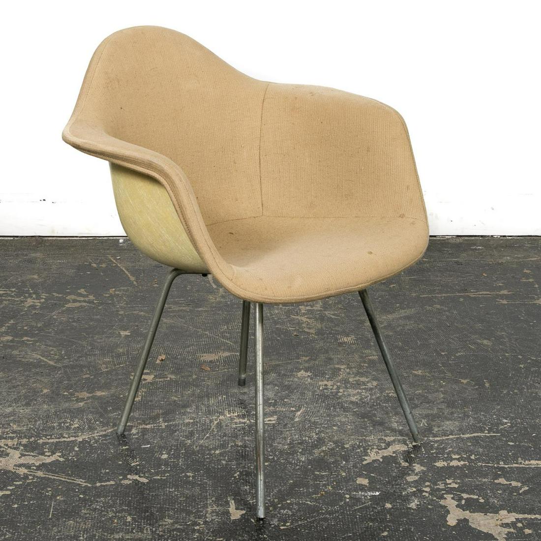Eames Herman Miller White Fiberglass Shell Chair: Charles and Ray Eames (American) for Herman Miller(American, founded 1905), c. 1954. A white fiberglass shell chair with white fabric cover. Herman Miller "Red Venice" label to underside. Approx. h. 2
