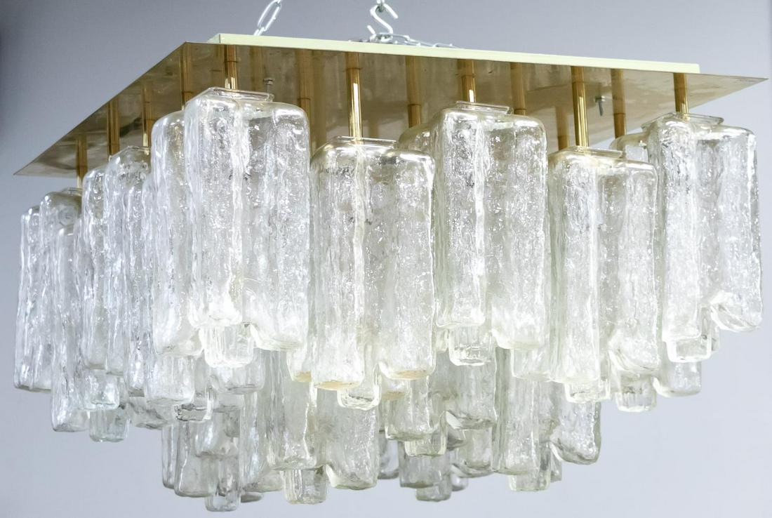 J.T. Kalmar "Granada" 24-Light Modern Chandelier: Julius Theodor (J.T.) Kalmar (Austrian, 1884-1968), last quarter 20th century. Stainless and molded glass twenty-four light modernist "Granada" chandelier having textured, shades set at various length