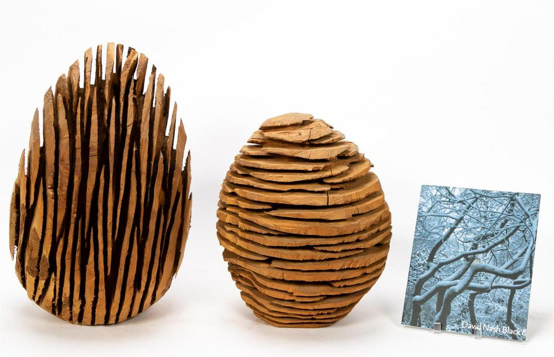 Pair, David Nash Wood Sculptures, "Bud and Flower": David Nash R.A.(American / English, b. 1945 - ). "Bud" and "Flower" - c. 1992, two carved wood sliced egg shaped sculptures, apparently unsigned. Approx. h. 22.5", w. 12" (largest), h. 18" (smallest).