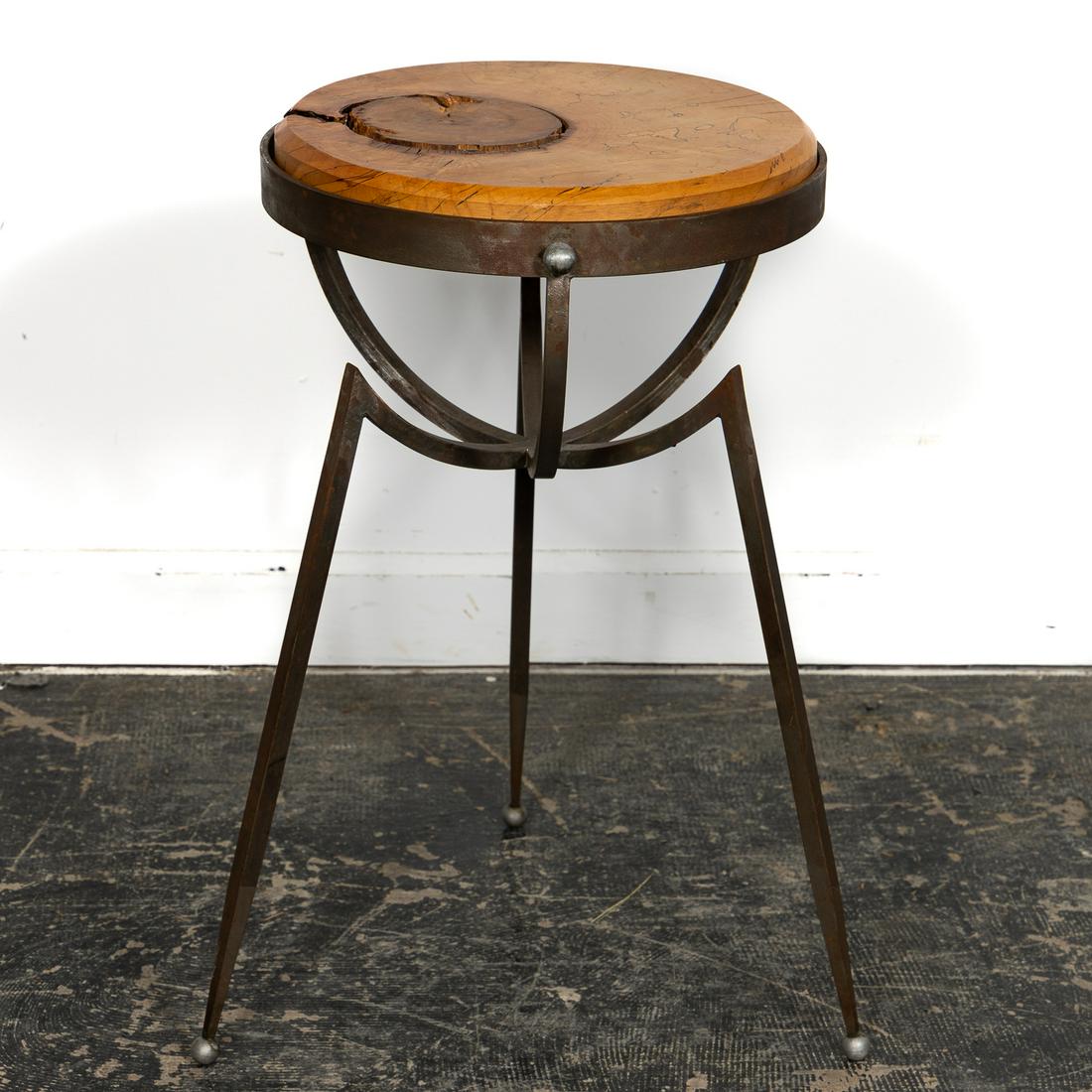 Contemporary Sculptural Side Table Iron & Wood: American or French, 21st century. A contemporary sculptural side table with geometric cast iron legs and unfinished wood insert. Unmarked. Approx. h. 27", diam. 16".