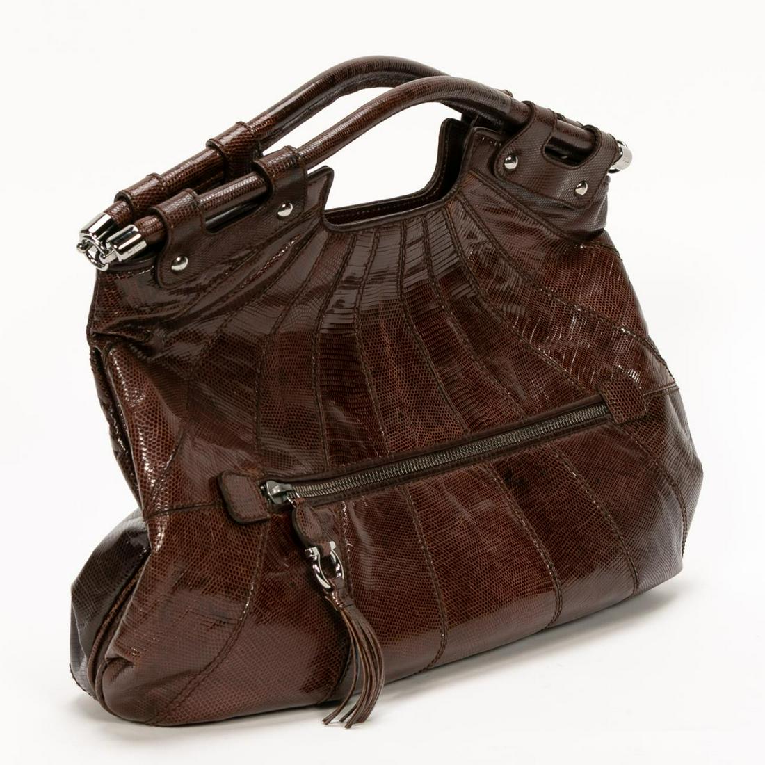 Ferragamo Brown Snakeskin & Suede Tote Bag: Salvatore Ferragamo Luxury (Italian, founded 1927). A brown snakeskin tote bag with large external zippered pocket accented by a silver tone horseshoe and tassel pull, a detachable shoulder strap and