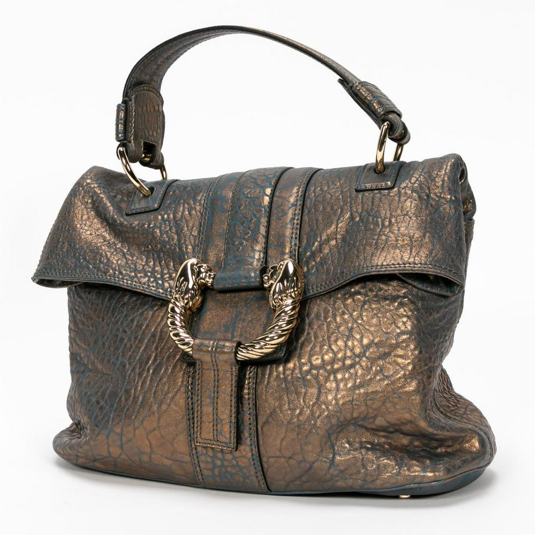 Bulgari Metallic Finish, Wrinkled Lamb "Gemma" Bag: Bvlgari (Italian, founded 1884). A "Gemma" handbag with topaz and gold metallic finish on wrinkled lambskin, a stylized gold tone lion handle and pull over closure with removable shoulder strap; the i