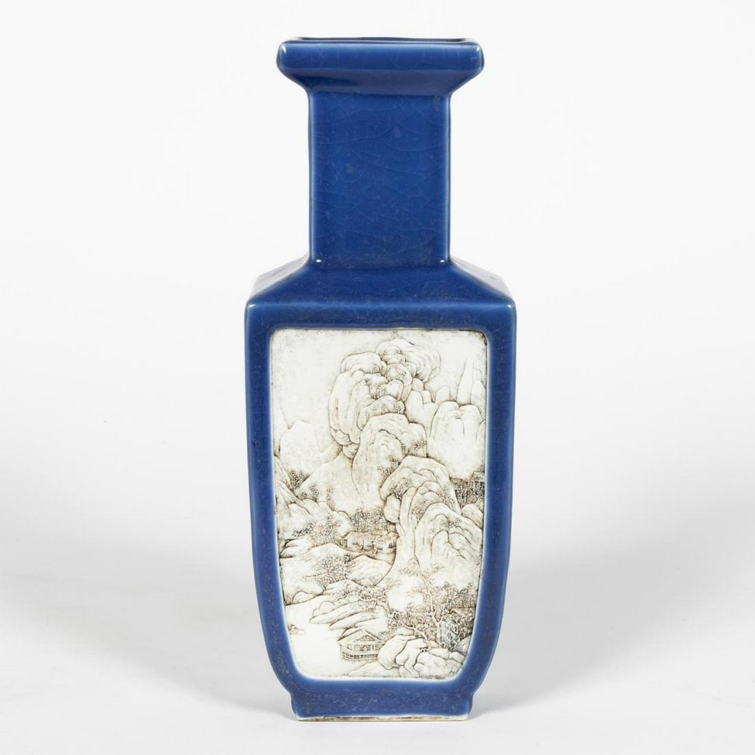 Chinese Qing Relief Panel Vase: Chinese, Qing dynasty. Square bangchuiping shape with blue glaze, the sides with molded highly detailed landscape scene panels in imitation of bone carvings with mountains, trees, houses, boats and fi