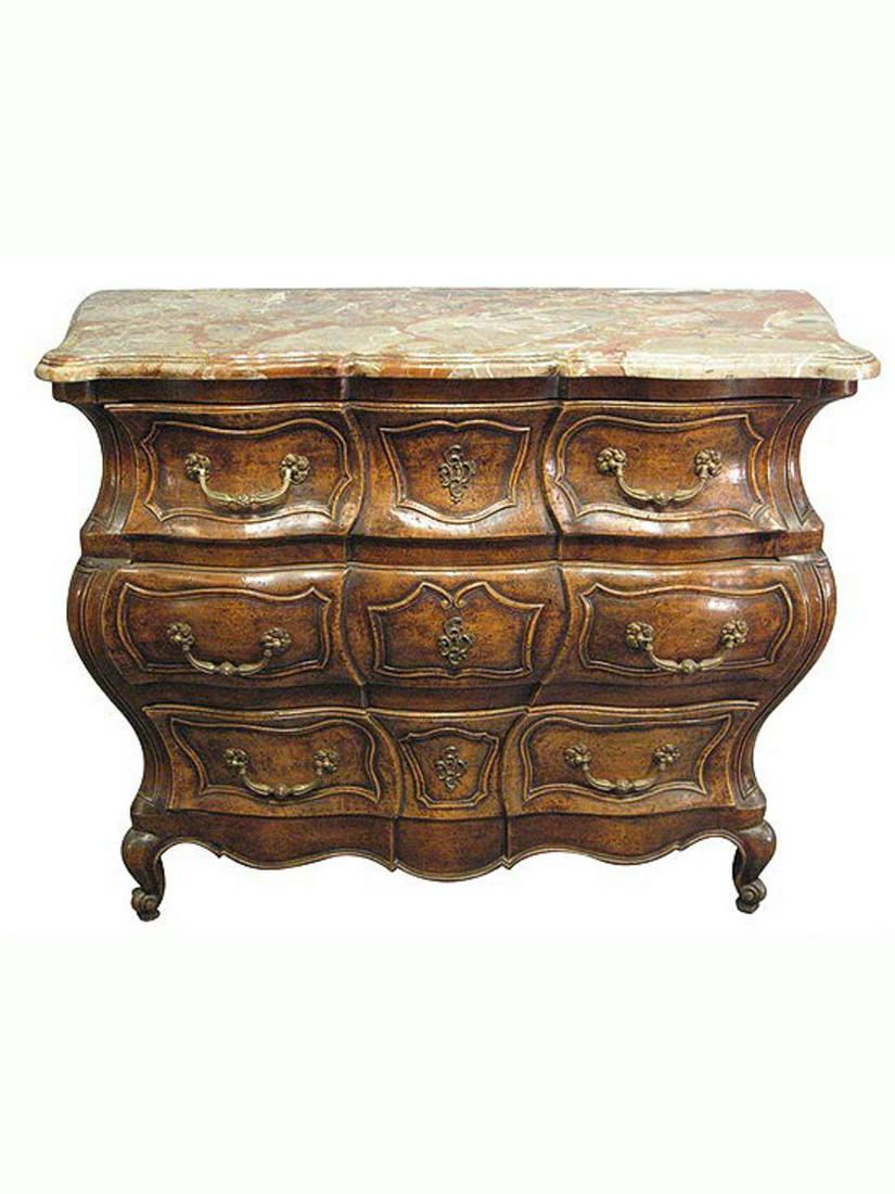 Louis XV Style Marble Top Bombay Commode: French, 20th century. A Louis XV style walnut bombe commode with three drawers and marble top. Approx. h. 36", w. 47.5", d. 22"
