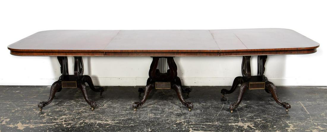 American Federal Style Eagle Base Banquet Table: American, early 20th century. Impressive mahogany banquet triple pedestal dining table in the Federal taste, having eagle and mirrored decoration to two pedestals, the third with double lyres, rising 