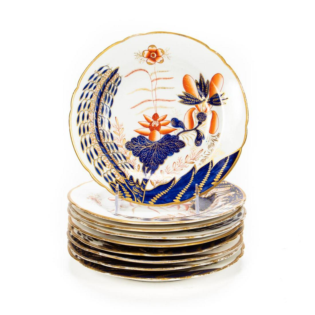 Set, 9 Spode Imari "Banana Tree" Plates, C. 1810: Spode (English, founded 1770), circa 1810. Earthenware rust and blue Imari palette "Banana Tree" plates with gilt accents and a foliate pattern. Marked to the underside Spode/2214. Approx. dia. 8.5".