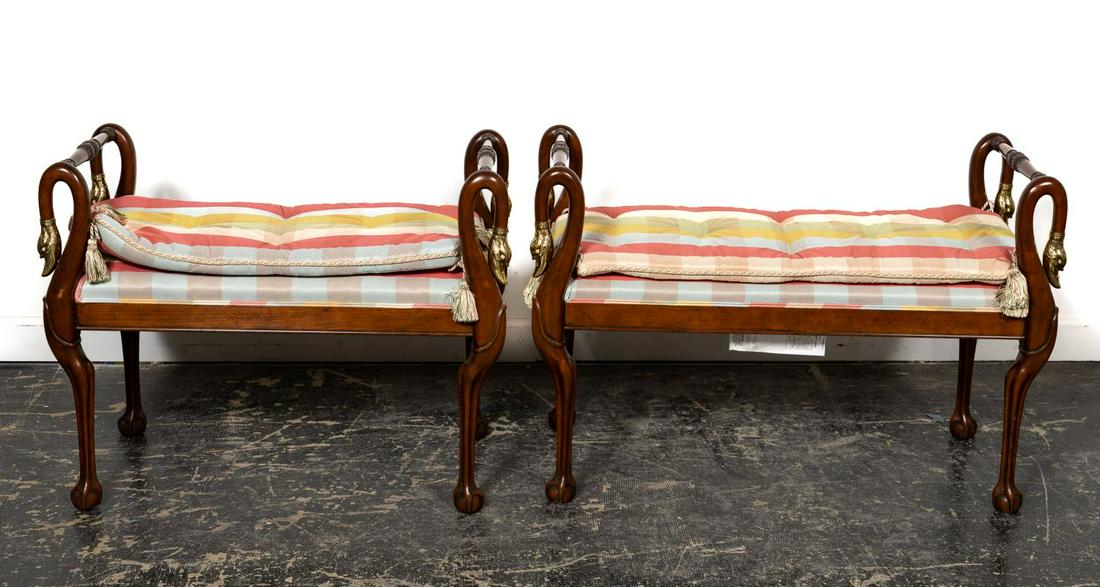 Pair of Baker Regency Style Swan Motif Benches: Baker Furniture (American, founded 1903), 20th century. A pair or Regency style cherry benches with swan neck arms and upholstered cushions. Baker tag to underside. Approx. h. 27", w. 40", d. 19".