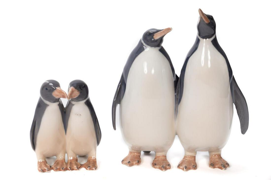 Two Royal Copenhagen Porcelain Penguin Figurines: Royal Copenhagen (Danish, founded 1775). Two porcelain penguin figurines including an adult pair (h. 7") and two children (h. 4"). Marked to underside accordingly. Provenance: From the Private Collect