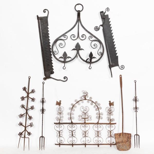 8pc, 19th C. European Iron Kitchen Implements: European, 19th to early 20th century. Group of eight pieces of wrought and forged Iron kitchen tools and implements, most having a scrolled and heart motif, comprising two trammels, a large two-pot ra