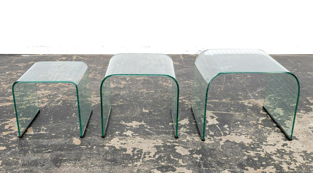 CORTESI FOR FIAM ETCHED GLASS WATERFALL TABLES: Angelo Cortesi (Italian, b. 1938- ) for FIAM (Italian, founded 1973), 1980s. A three-piece glass waterfall nesting side tables with an etched grid pattern. FIAM clear sticker to smallest table. Approx