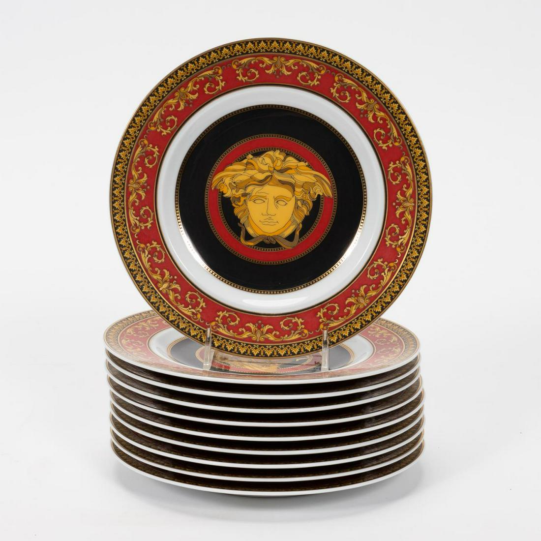 SET, 10 VERSACE MEETS ROSENTHAL BREAD PLATES: Versace (Italian, founded 1978), Rosenthal (German, founded 1879), late 20th century. Set of ten Versace Meets Rosenthal gilded "Ikarus Medusa" or "Medusa" (introduced 1994) porcelain bread plates hav