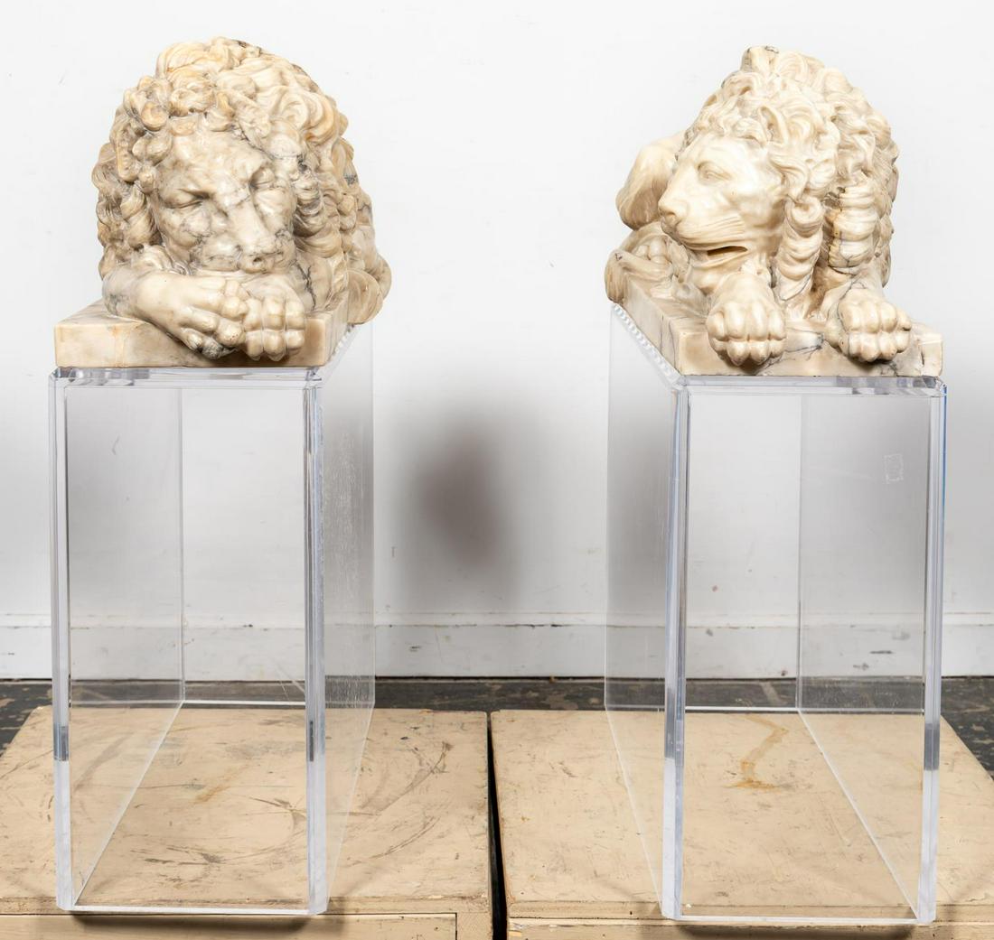 PR, FINELY CARVED 19TH C. ALABASTER GUARDIAN LIONS: Italian, 19th century. Pair of finely carved grand tour alabaster recumbent lions, after Antonio Canova (Italian-Austrian, 1757-1822), depicting one lion asleep while the other stands guard, on later
