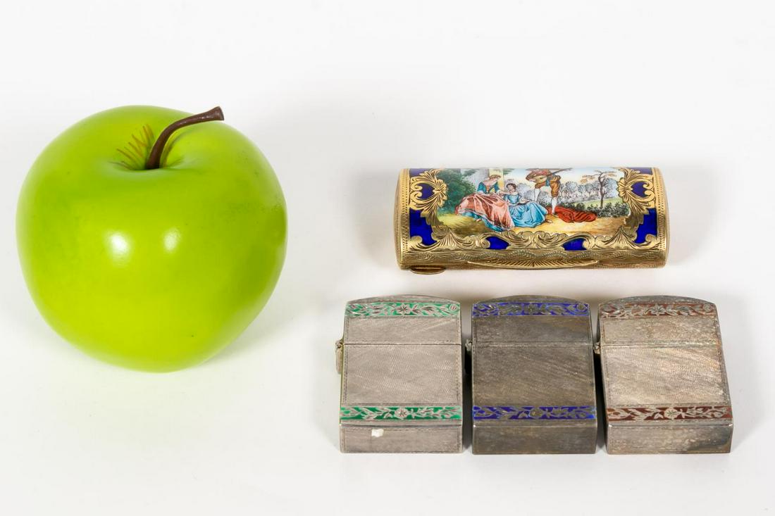 3 ITALIAN 800 SILVER CASES & A VERMEIL ENAMEL BOX: Italian, 20th century. Four pieces of 800 silver, vermeil with polychrome enamel comprising three Zippo lighter cases having engine turned and red, blue and green scrolled enamel work and an ovoid for