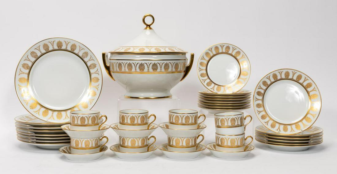 GINORI "POMPEI GOLD" PORCELAIN DINNER SERVICE: Richard Ginori (Italian, founded 1735). A "Pompei Gold" (active 1966-1997) porcelain dinner service for six (thirty-eight total pieces) comprising of eight dinner plates (diam 10.375"), six salad plat