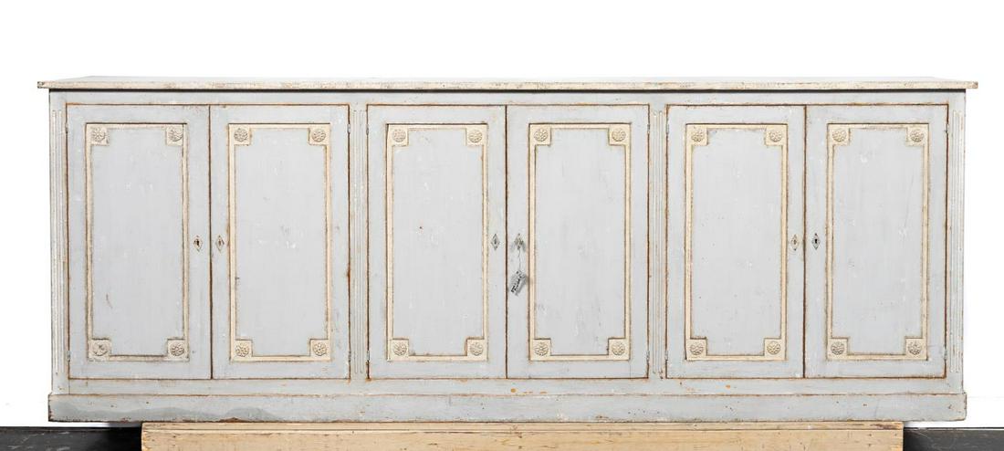 E. 20TH C. FRENCH GREY PAINTED WOODEN ENFILADE: French, early 20th century. Large wooden enfilade or credenza having a distressed grey painted finish, six-doors with applied moulding and rosettes and rising on a plinth base. Unmarked. approx. h. 43