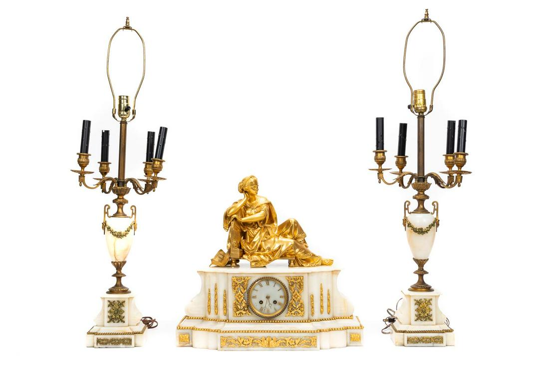 19TH C., NAPOLEON III ONYX & BRONZE GARNITURE SET: Japy Freres & Cie (French, 1850-1930). A three piece garniture set, in the Louis XVII style, including a three piece Napoleon III era mantle clock constructed from two pieces of light onyx, a roman nu