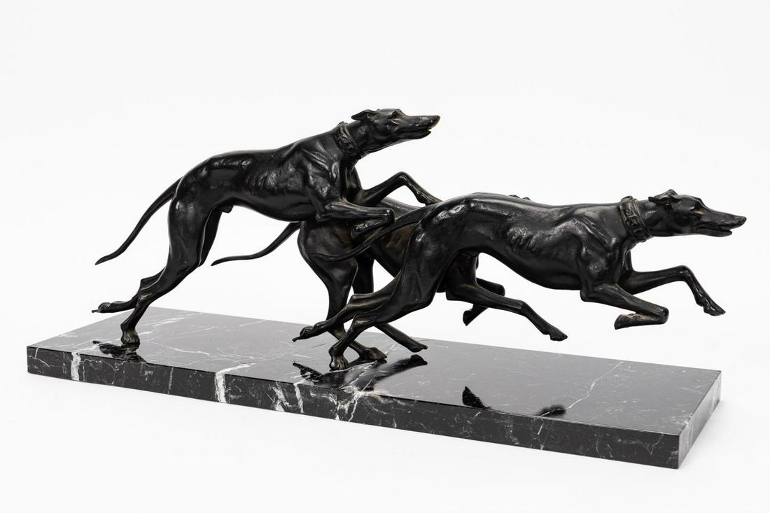 MANNER OF LIMOUSIN, BRONZE GREYHOUND SCULPTURE: Manner of Jacques Limousin (French, 20th century). Art Deco style sculpture of multiple greyhounds - cast bronze on marble base, the marble inscribed "Limousin". Figural group of three racing greyhoun
