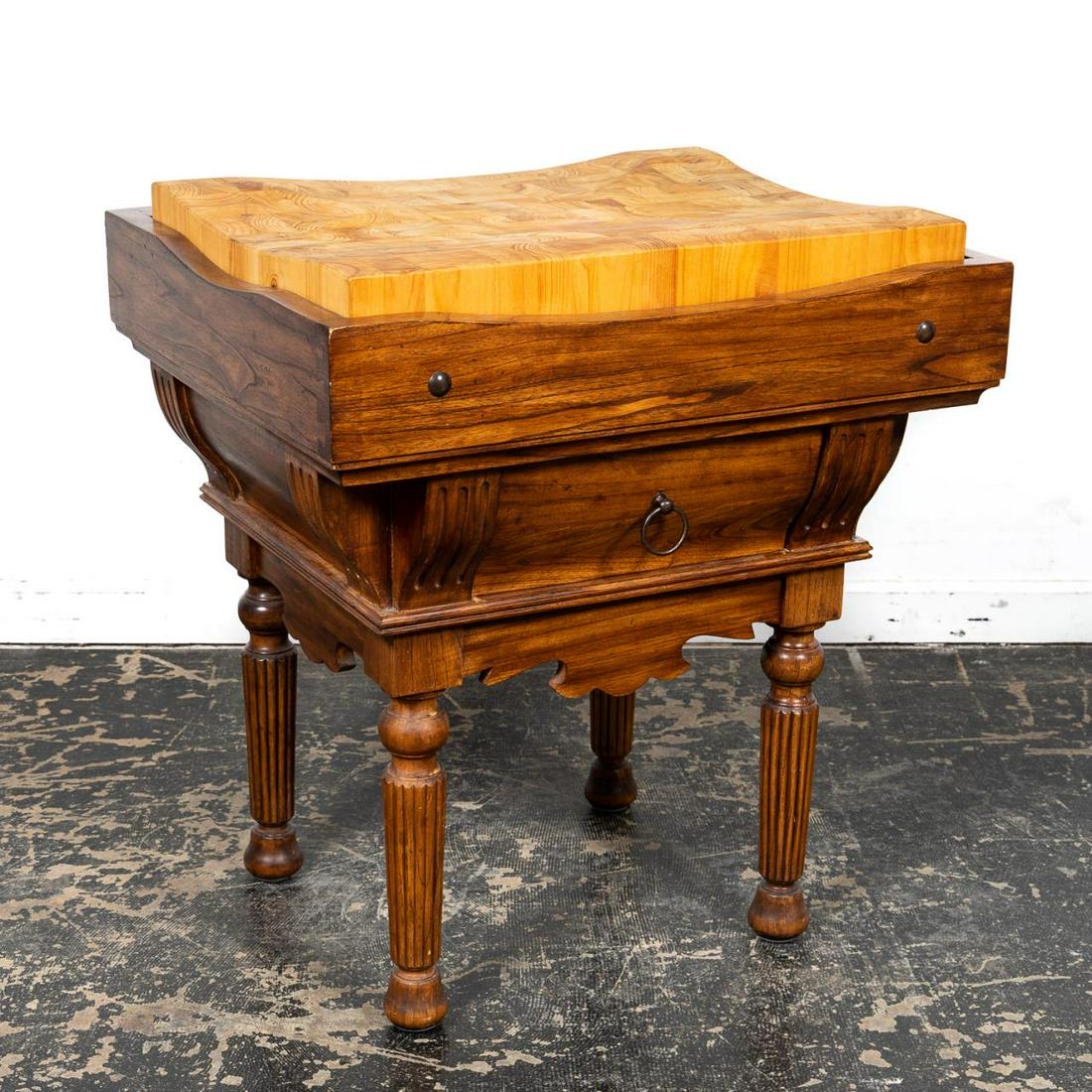 FRENCH STYLE BUTCHER BLOCK ON STAND, CONTEMPORARY: Indonesian, circa 2009. French style maple butcher on a hardwood stand in the style of the 19th century having a removable block, single drawer and rising on fluted legs. Country of origin label to th