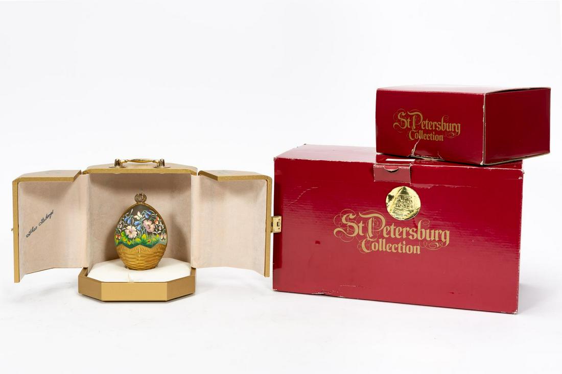 THEO FABERGE, "THE SUMMER EGG" HAND DECORATED: Theo Faberge (English, 1922-2007). A cold cast and glass egg with heavily gilt decorative scaling, having two floral and foliate decorated scenes and topped with a vermeil crown, produced in 1989. Mar