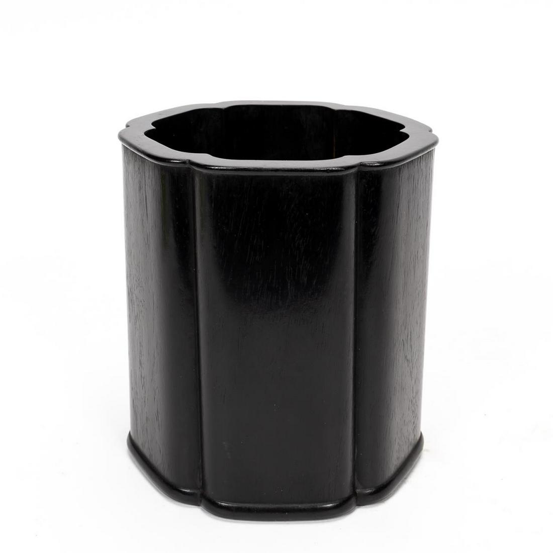 CHINESE EBONY ZITAN WOOD BRUSH POT: Chinese, 20th century. An ebony zitan wood brush pot with scalloped edges. Apparently unmarked. Approx: h. 7.5", w. 6.75".