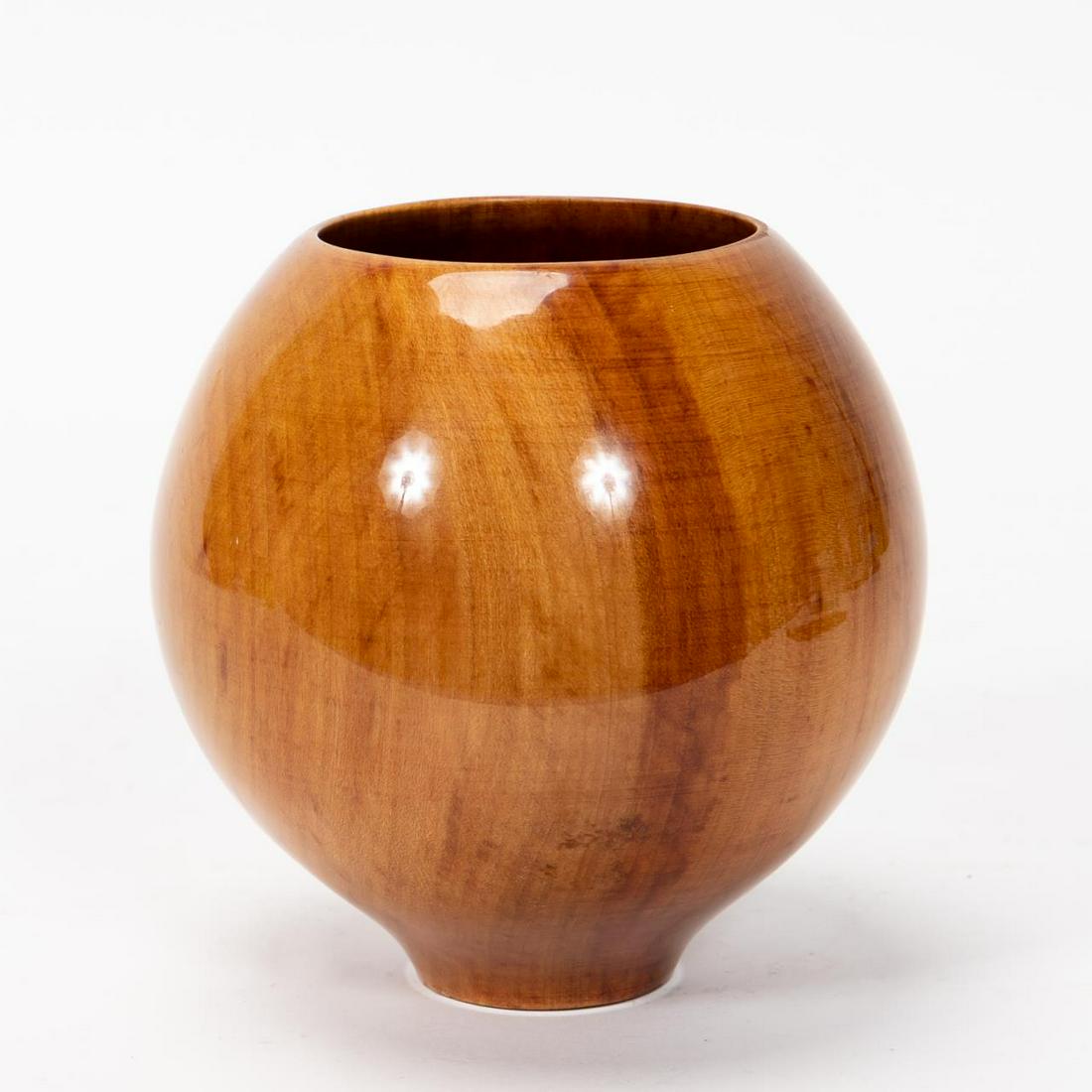 PHILIP MOULTHROP, HAND TURNED WOODEN VESSEL: Philip Moulthrop (American, Atlanta, Georgia, 1947- ). A hand turned wooden vessel with a polished clear veneer surface. Marked to underside "Philip Moulthrop, G. Ulmus, 6901". Approx: h. 6.25", w. 6.