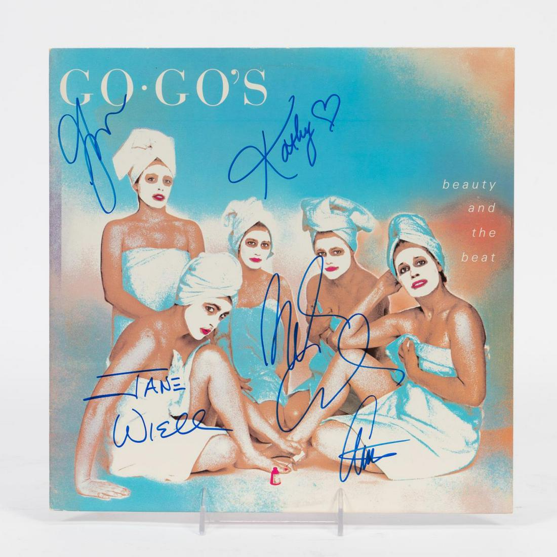 THE GO-GO'S "BEAUTY AND THE BEAT" AUTOGRAPHED LP: The Go-Go's (American, formed 1978). An album or record "Beauty and The Beat" signed by Belinda Carlisle, Jane Wiedlin, Margot Olavarria, Charlotte Caffey, and Kathy Valentine. Approx: 12.25" x 12.25"