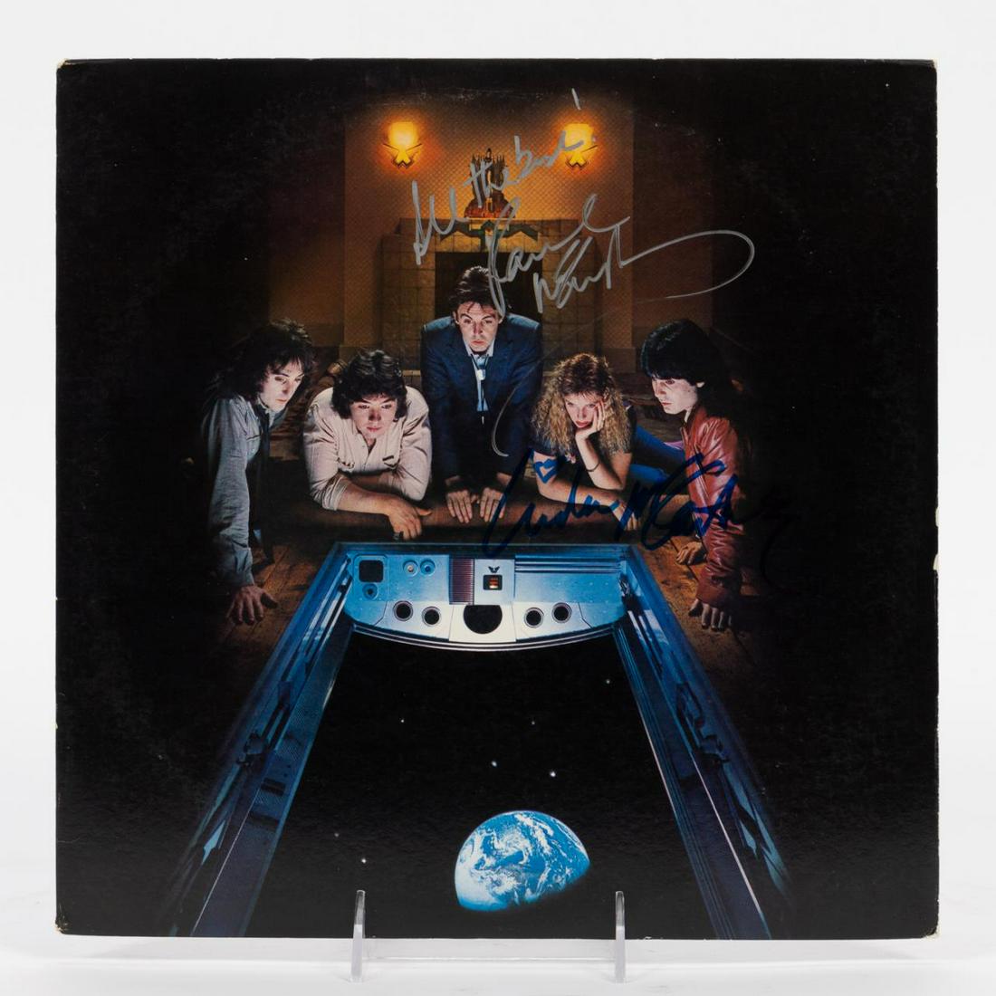 WINGS, "BACK TO THE EGG" AUTOGRAPHED RECORD: Paul McCartney and Wings (British, formed 1981). An album or LP "Back to the Egg" signed by Paul and Linda McCartney". Approx: 12.25" x 12.25".