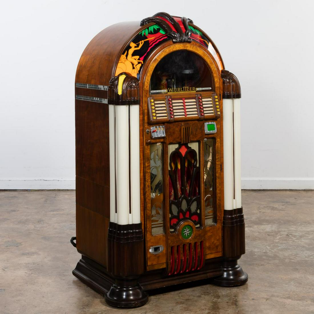 WURLITZER MODEL 950 "GAZELLE" GOLDEN AGE JUKEBOX: Wurlitzer (American, founded 1853), Paul Max Fuller (Swiss, 1897- 1951), circa 1942. Designed by Paul Fuller, a rare golden age model 950 "Gazelle" or "Victory (named after troops returning from WWII)