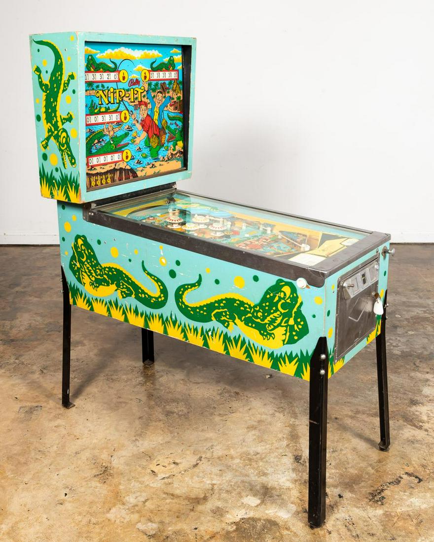 1973 BALLY, "NIP-IT" ELECTRONIC PINBALL MACHINE: Bally Gaming Technology (American, founded 1932), circa 1973. An electronic pinball machine "Nip-It" designed by Ted Zale and Dick White with a lighted playing field, four player score board, and zipp