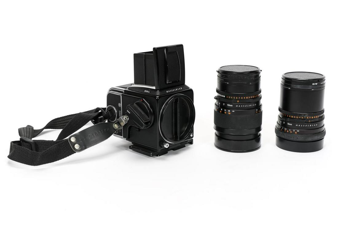 5 PC, HASSELBLAD 503CXI CAMERA BODY & LENSES: Hasselblad (Swedish, founded 1841). A three piece grouping of photography equipment including a 503CXI camera body, a 50mm Carl Zeiss for Hasselblad distagon 4/50 step up filter, and a 150mm Carl Zeis
