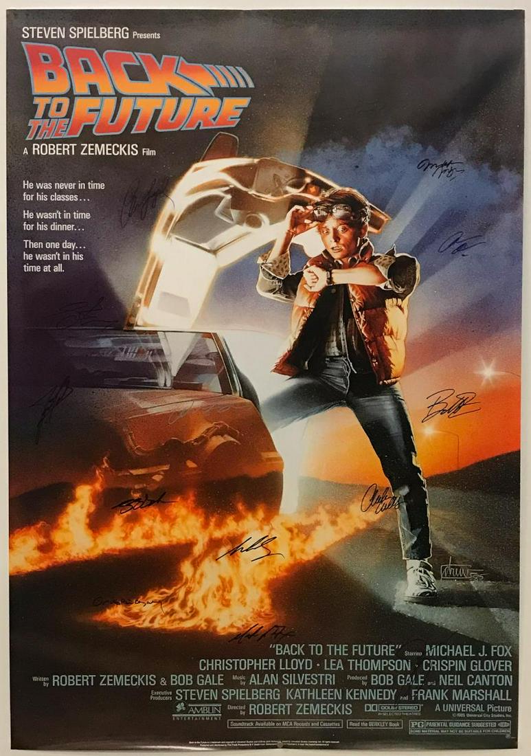CAST SIGNED "BACK TO THE FUTURE" MOVIE POSTER: Back to the Future (American, released 1985). A movie poster signed by fourteen cast members including Michael J Fox and Steven Spielberg. Approx: 40" x 27".