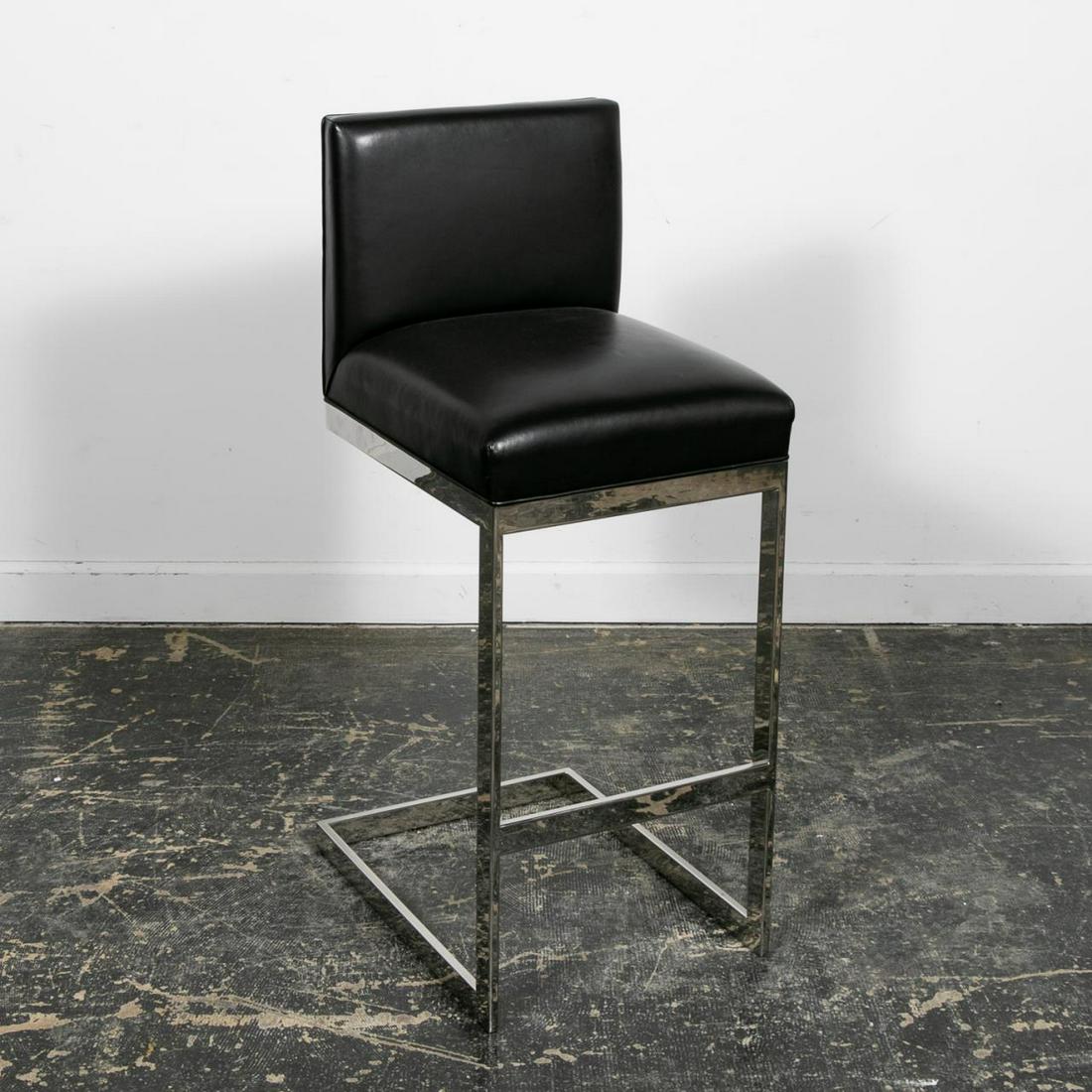 HS-2 CHROME UPHOLSTERED BAR STOOL BY BREUTON: Brueton Furniture (American, est. 20th century), 21st century. A minimalist "HS-2" leather and chrome bar stool. Approx. h. 41", w. 16", d. 18.75".
