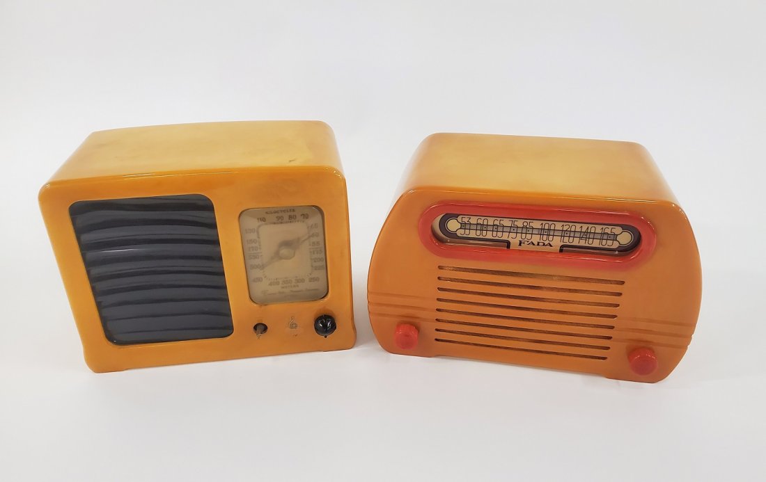 TWO, CATALIN BUTTERSCOTCH RADIOS, FADA AND EMERSON: Fada Radio (American, 1918-1934), Emerson (American, founded 1912), early 20th century. Two art deco bakelite butterscotch radios including a two tone model 652 Fada radio with red dials and tune pane