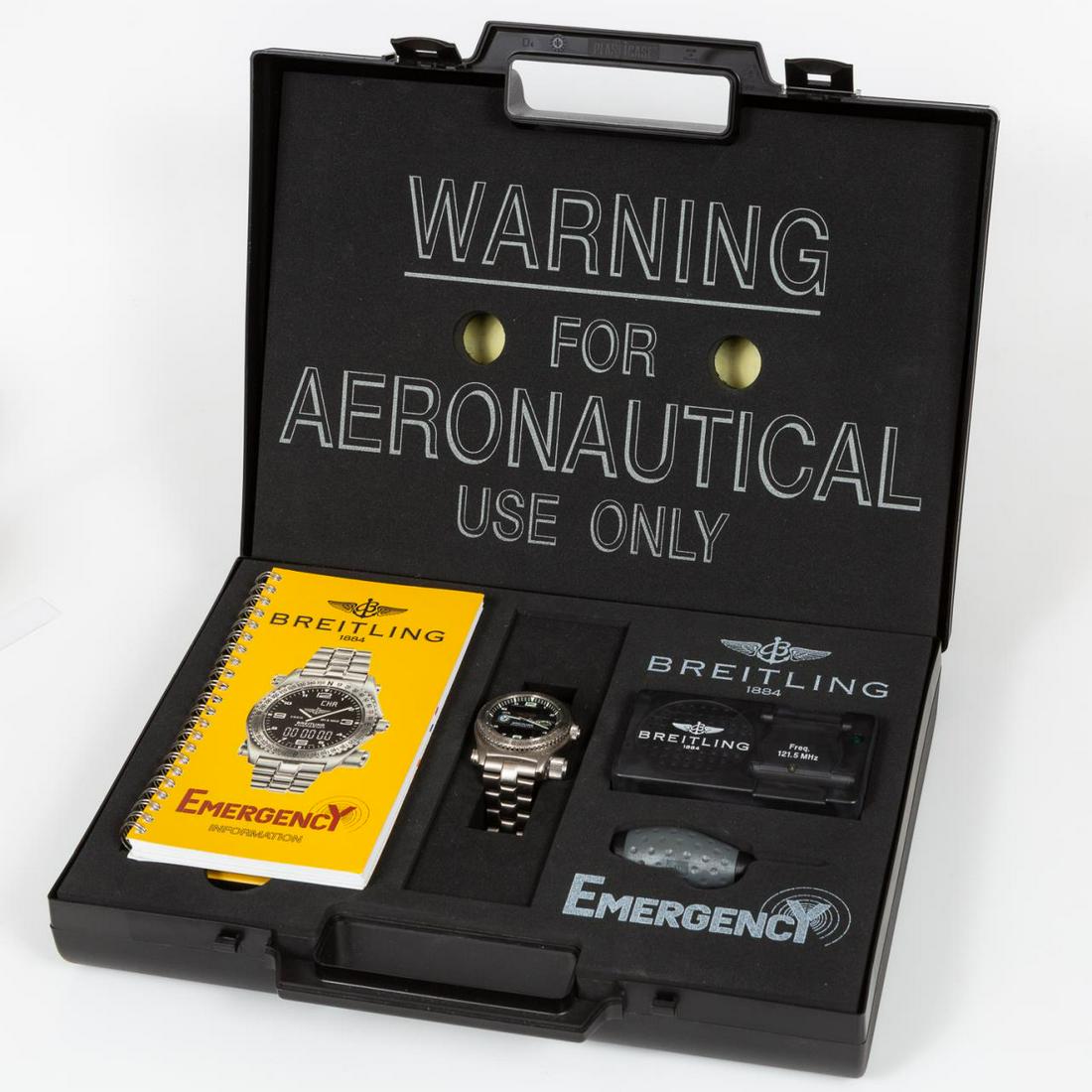 BREITLING, "RAF - EMERGENCY" TITANIUM WRIST WATCH: Breitling (Swiss, founded 1884). A rare men's polished titanium "Royal Air Force Squadron" Emergency wrist watch with 43mm case, swiss quartz movement, alarm, chronograph, chronometer certified, tripl