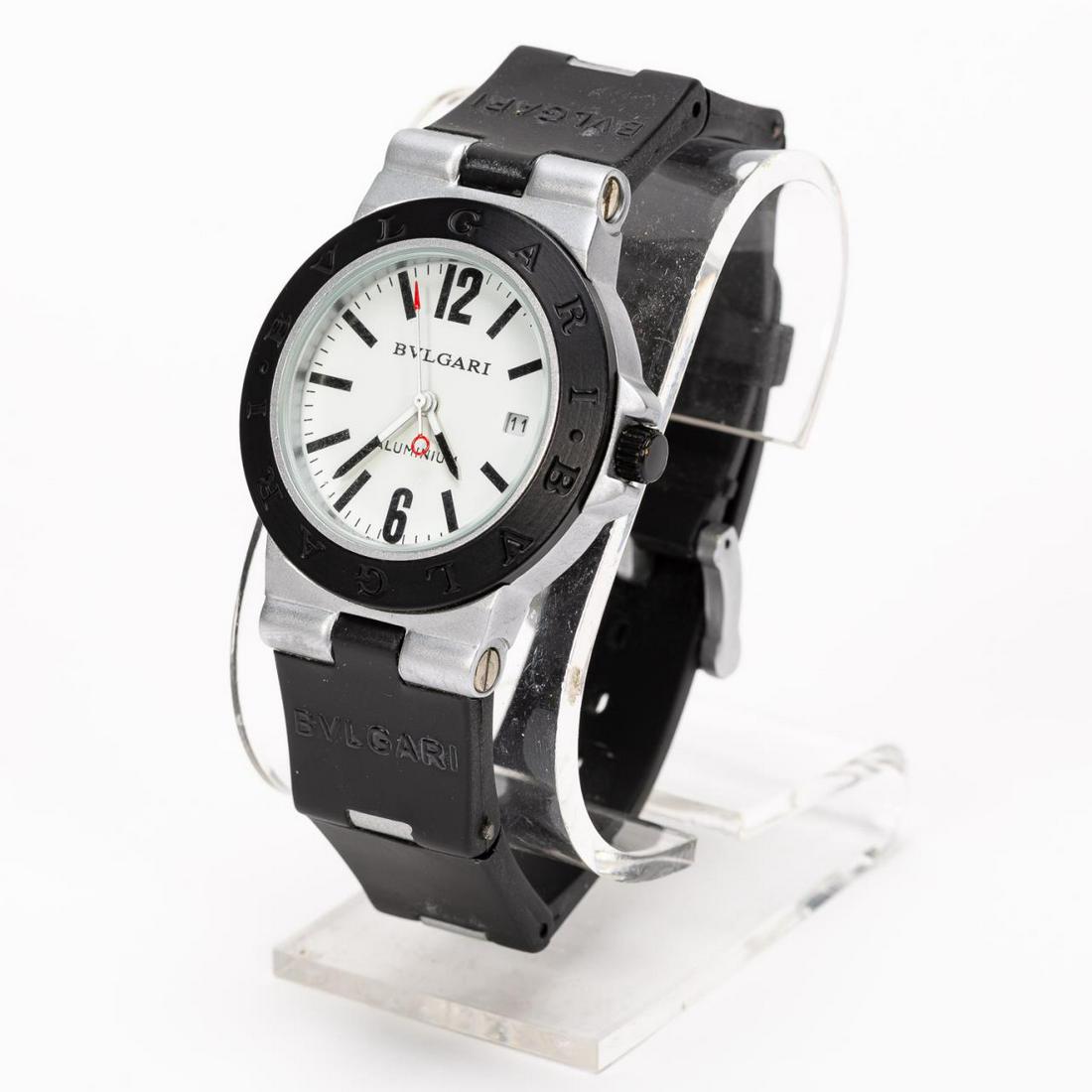 BVLGARI DIAGONO ALUMINUM AL38A 38MM MEN'S WATCH: Bulgari (Italian, founded 1884). A Diagono aluminum model AL38A 38mm men's watch with a date window, rubberized band and belted clasp. Marked to the verso "Bvlgari, AL 38A, L3276, Fabrique Ensuisse".