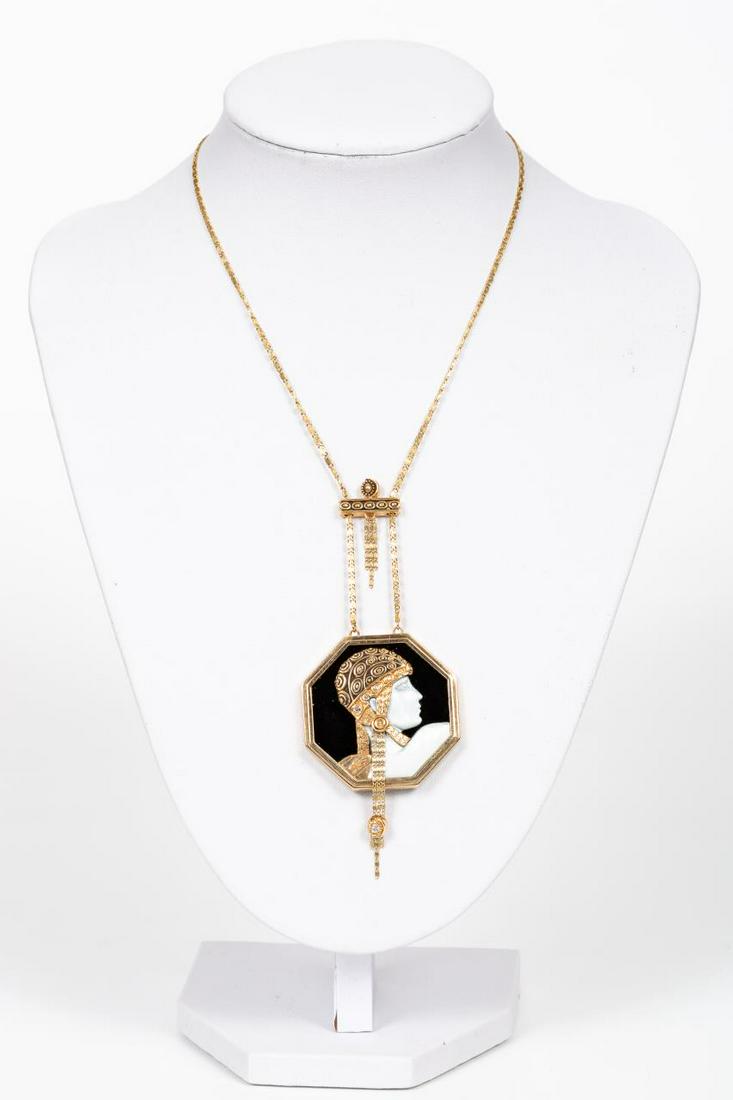 ERTE ART DECO-STYLE 14K GOLD NECKLACE, MOP & ONYX: A vintage, circa 1979, Erte limited edition art deco style 14k yellow gold necklace with an octagonal medallion comprising of onyx, mother of pearl, and six tiny diamonds. Marked to back of horizontal