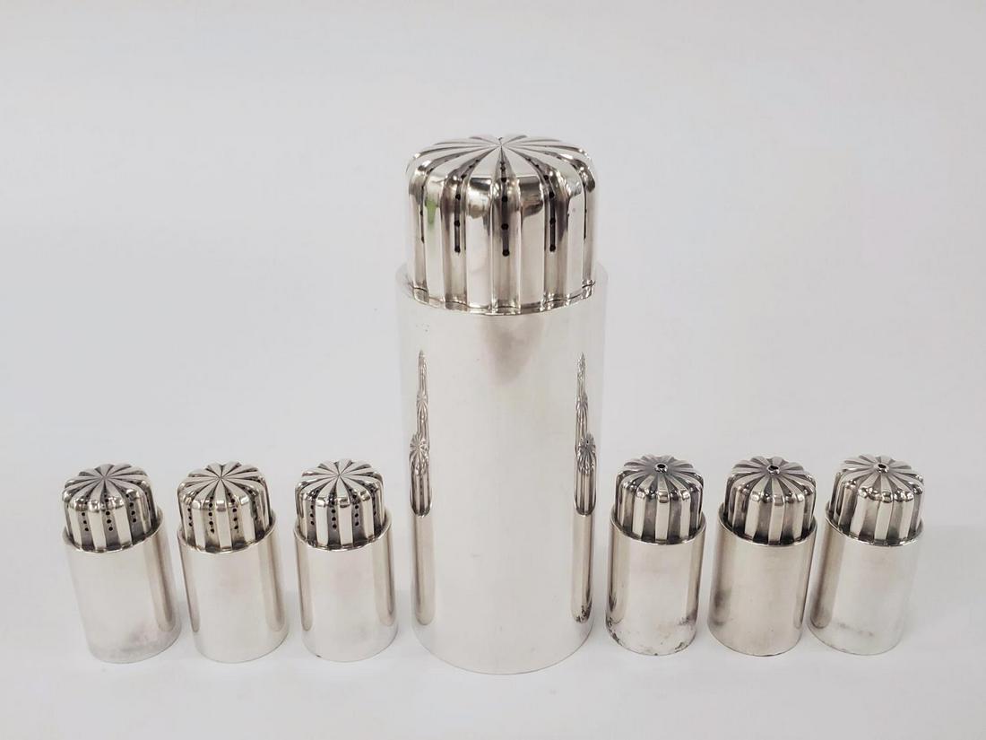 SEVEN, GEORG JENSEN "BERNADOTTE" TABLE ACCESSORIES: Georg Jensen (Danish, 1866-1935), Sigvard Bernadotte (Swedish, 1907-2002); post 1945. A seven piece grouping of "Bernadotte" pattern (active 1939 - present) table accessories comprising of a sugar sha