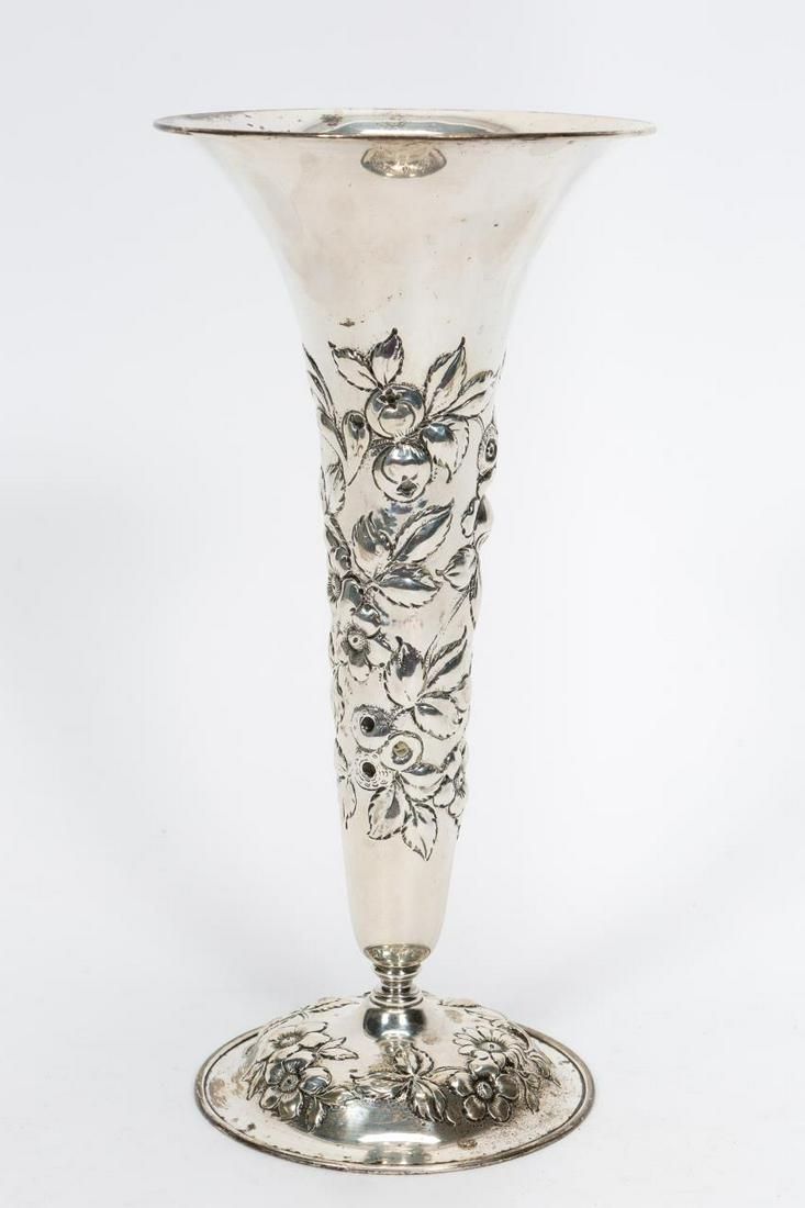 S. KIRK & SON REPOUSSE STERLING TRUMPET VASE: Samuel Kirk & Son (American, (Baltimore) founded 1815), circa 1896-1924. A sterling silver trumpet shaped vase having floral repousse decoration. Makers marked to underside of foot, "925/1000", "100".