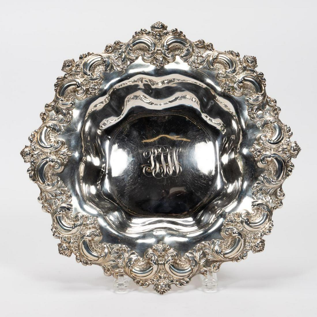 FRANK SMITH AMERICAN STERLING SILVER REPOUSSE BOWL: Frank W. Smith (American (Massachusetts), 1886-1958) and retailed by Schwarzchild Bros. (American (Richmond), est. 1890), late 19th / early 20th century. An ornate Rococo revival sterling silver cente