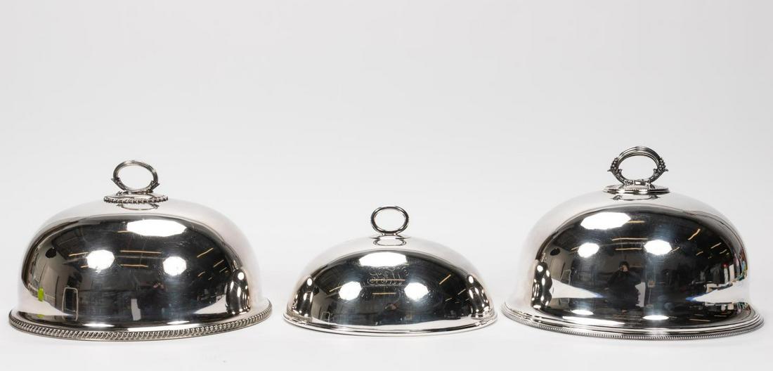 THREE BRITISH & AMERICAN SILVERPLATED MEAT DOMES: American and British, 19th and 20th century. Group of three silverplated meat domes comprising one from Mappin & Webb (English, Founded 1775), James Dixon & Sons for Warring & Gillow Ltd. (British, 18