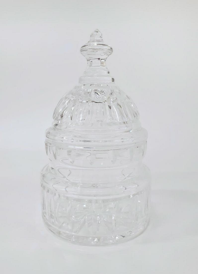 WATERFORD CRYSTAL CAPITAL DOME BISCUIT BARREL: Waterford Crystal (Irish, founded 1783). A crystal capital dome form biscuit barrel or candy dish. Marked to underside "Waterford". Approx: h. 9.5", w. 6".