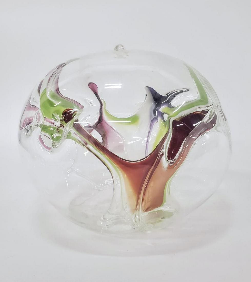 PETER BRAMHALL, BLOWN ART GLASS ORB, 1999: Peter Bramhall (American, born 1942). A colorful blown out art glass orb. Marked to underside "Peter Bramhall, 10 June, 1999". Approx: h. 8.75", w. 10".