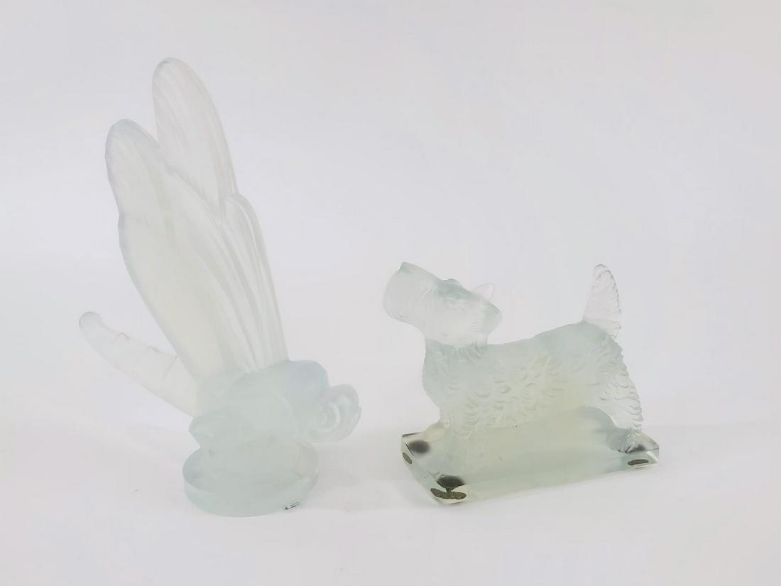 TWO, FRENCH SABINO IRIDESCENT FIGURAL PAPERWEIGHTS: Sabino (French, founded 1925). Two pieces of iridescent figural paperweights including a dragonfly or "Libellule" car mascot (6") and a Scottie dog or Scottish terrier (3.5"). Marked to underside "Sab