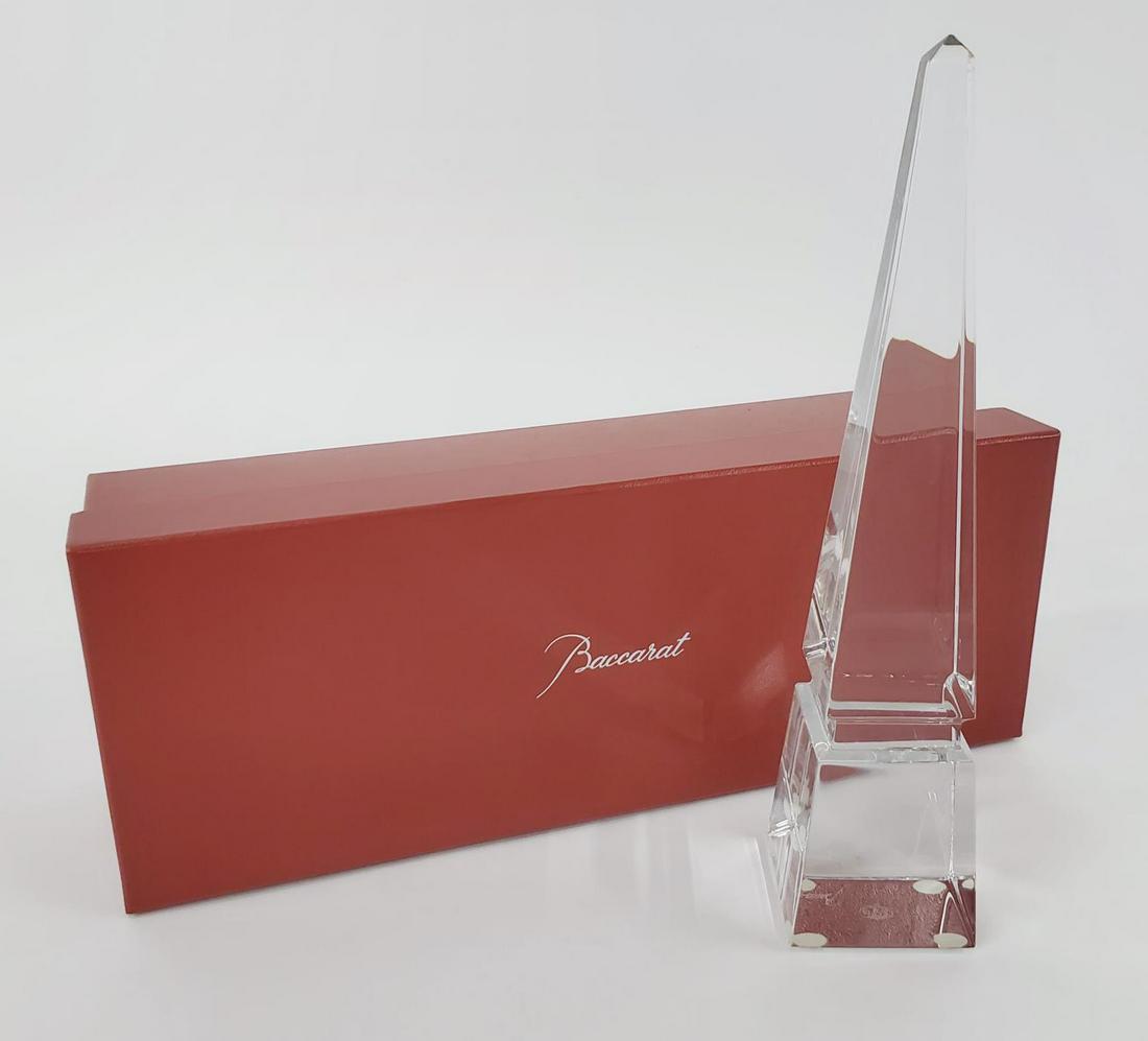 BACCARAT CRYSTAL "LUXOR OBELISK 250", 9.5": Baccarat (French, founded 1764). A glass "Luxor Obelisk 250" in original box. Marked to obelisk "Baccarat". Approx: h. 9.5", w. 2.25".