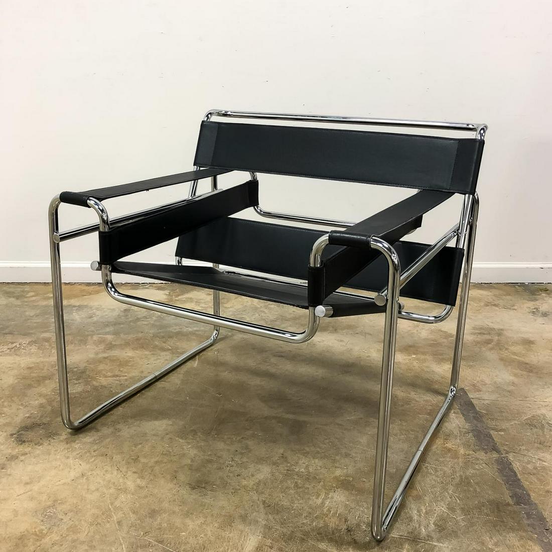 MARCEL BREUER STYLE "WASSILY" LOUNGE CHAIR: Marcel Breuer for Knoll style steel and stitched leather "Wassily" chair. Apparently unmarked. Approx: h. 28.75", w. 31", d. 27".