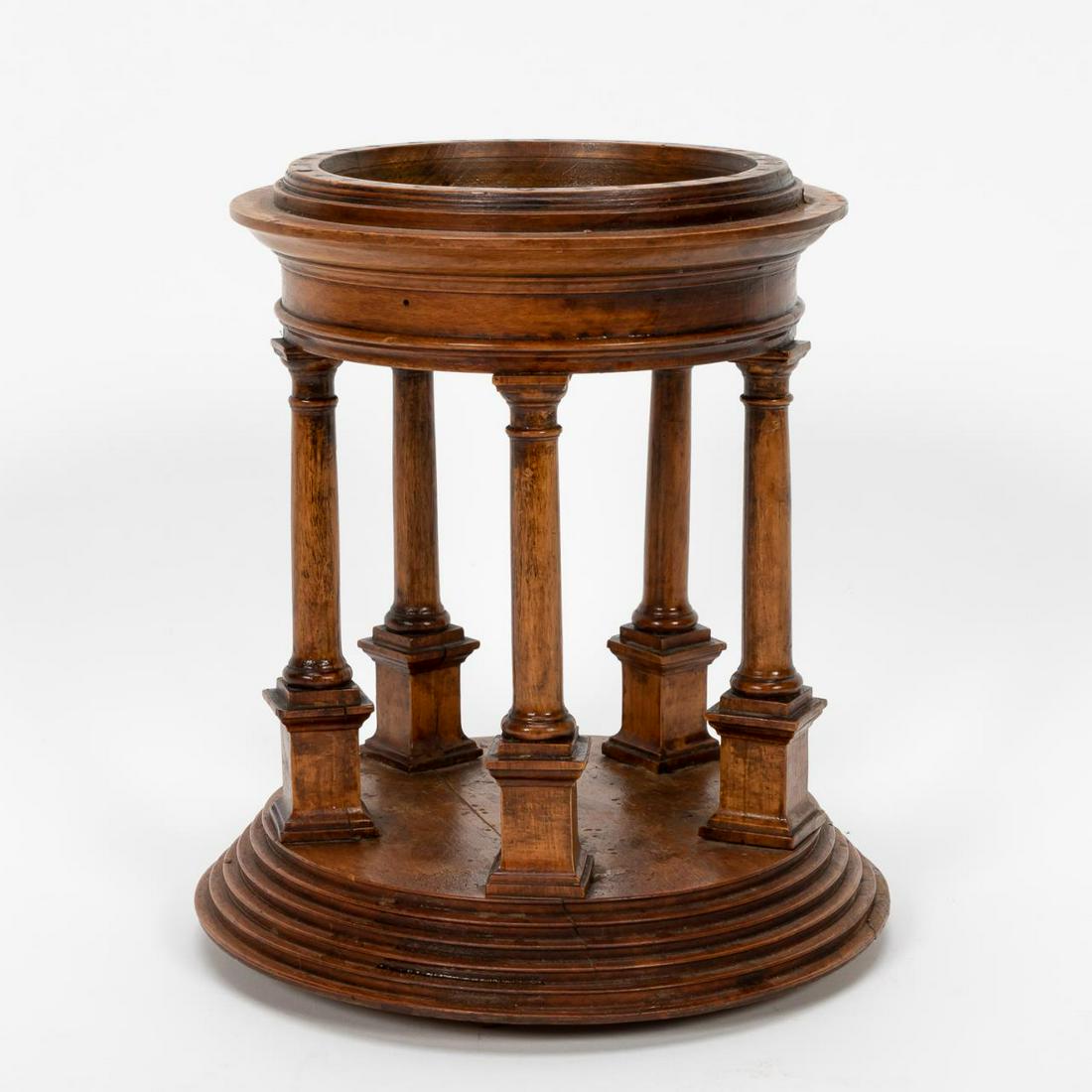 19TH C. ENGLISH ARCHITECTURAL MODEL OF A FOLLY: English, 19th century. Turned wooden architectural model of a circular folly having Tuscan columns on rectangular plinth, with a stepped base. Unmarked. Approx. h, 8.5", dia 7.5"