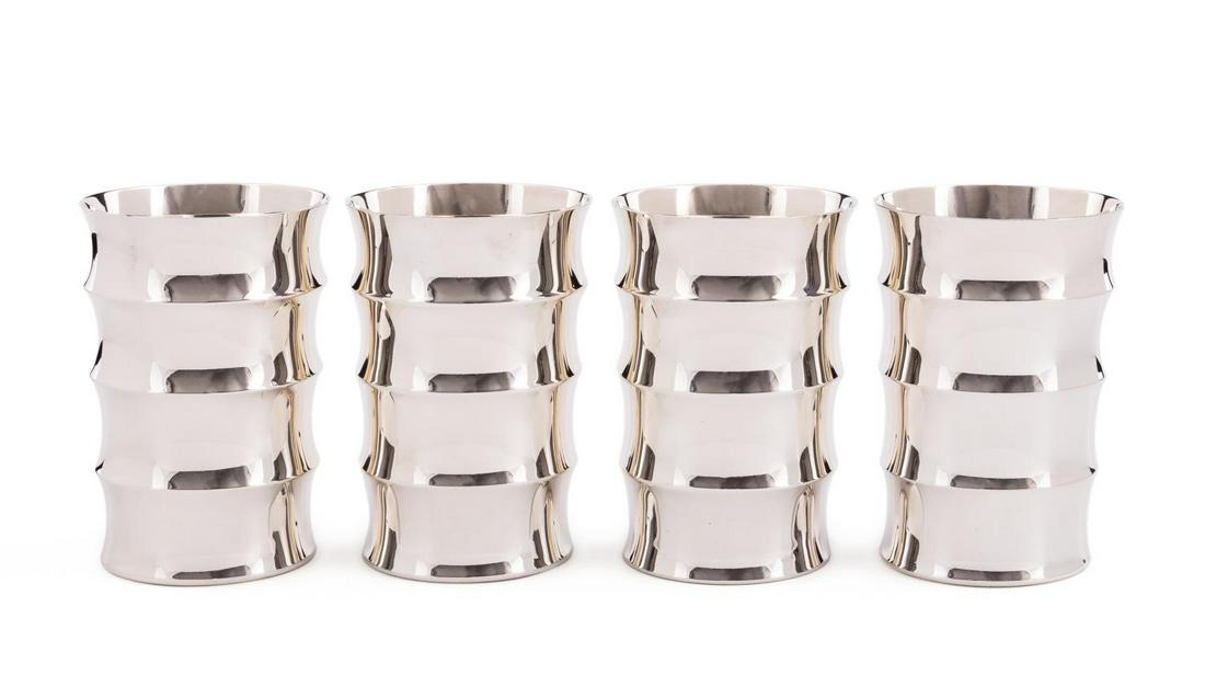 SET, 4 TIFFANY & CO. STERLING BAMBOO FORM TUMBLERS: Tiffany & Co., contemporary. Group of American sterling silver four bamboo motif tumblers having concave patterned bodies. Marked to underside, "Tiffany & Co", "Sterling", and "547". Approx. total wei