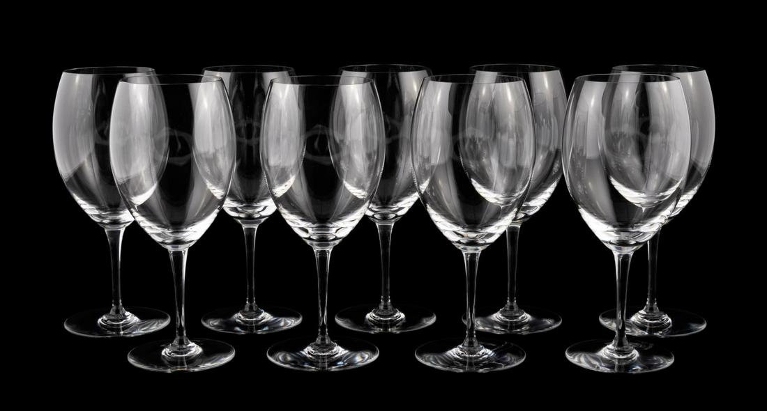 NINE BACCARAT "SAINT EMILION" MAGNUM WINE GLASSES: Baccarat, contemporary. A set of nine "Saint Emilion" or "Haut Brion" pattern crystal wine glasses. Signed to underside "Baccarat". Approx: h. 9.5", w. 4".